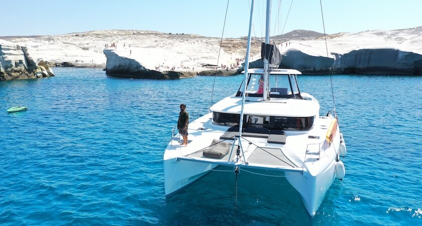 Catamaran at anchor in Milos